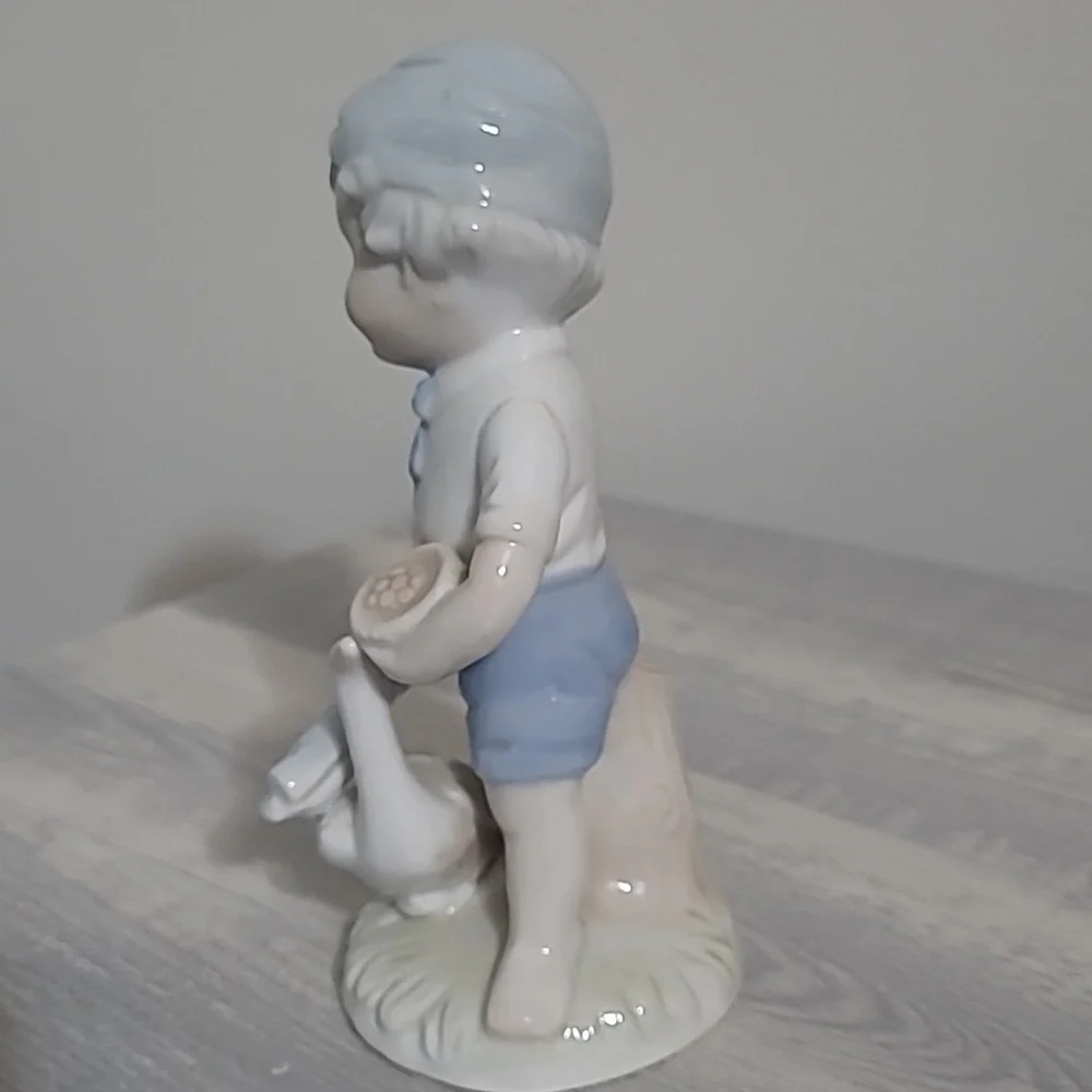 Unique Vintage Blue and White Porcelain Boy with Goose Figurine